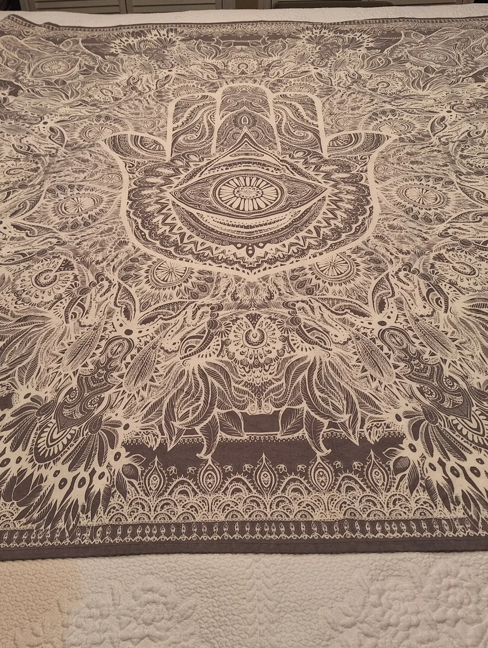 Urban Outfitters gray and white Hand of Hamsa tapestry
